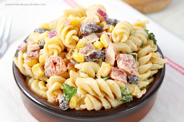 Creamy Chipotle Pasta Salad in a brown bowl close up.