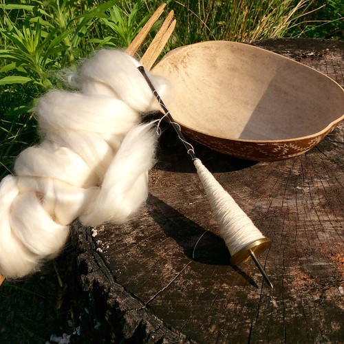 Handspinning Egyptian cotton top on takhli supported spindle with calabash bowl