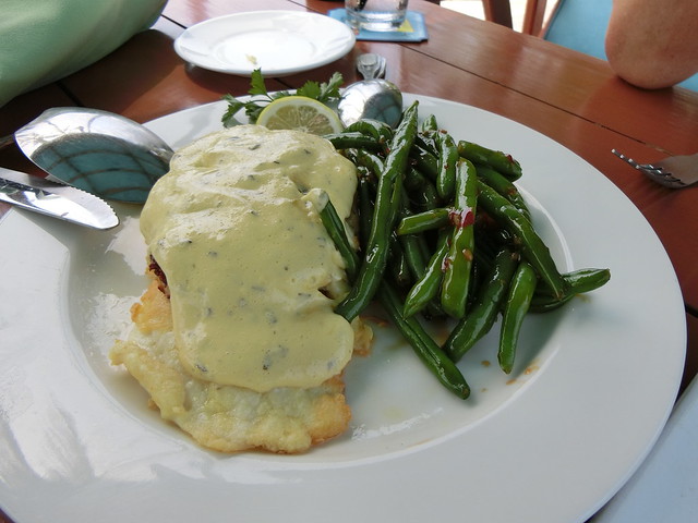 Hogfish topped with Crab Cake and Sauce, side of Asian Greenbeans