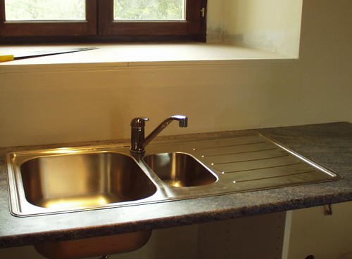 Kitchen sink plus tap