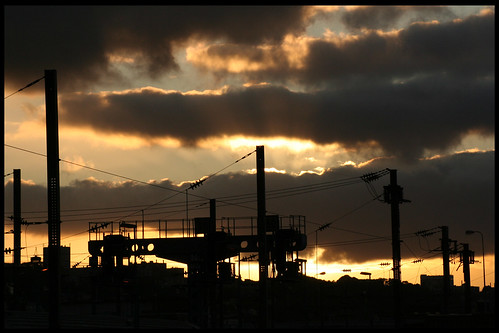railroad clouds sunrise shadows
