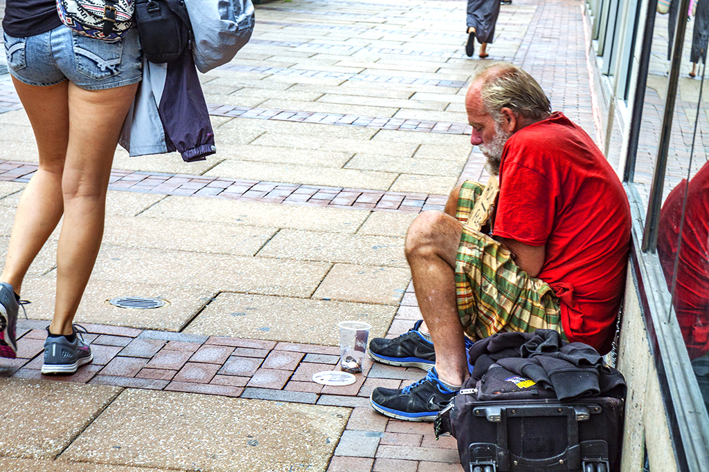 Middle aged man begging on Market St on 7-15-15--Center City