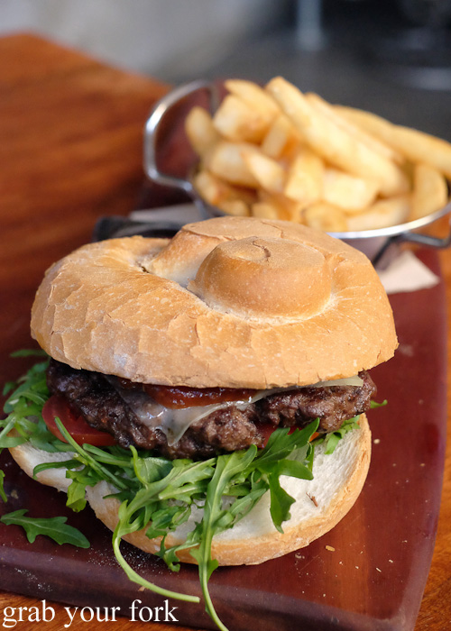 Double baked wagyu beef burger with chips at The Local Mbassy, Ultimo