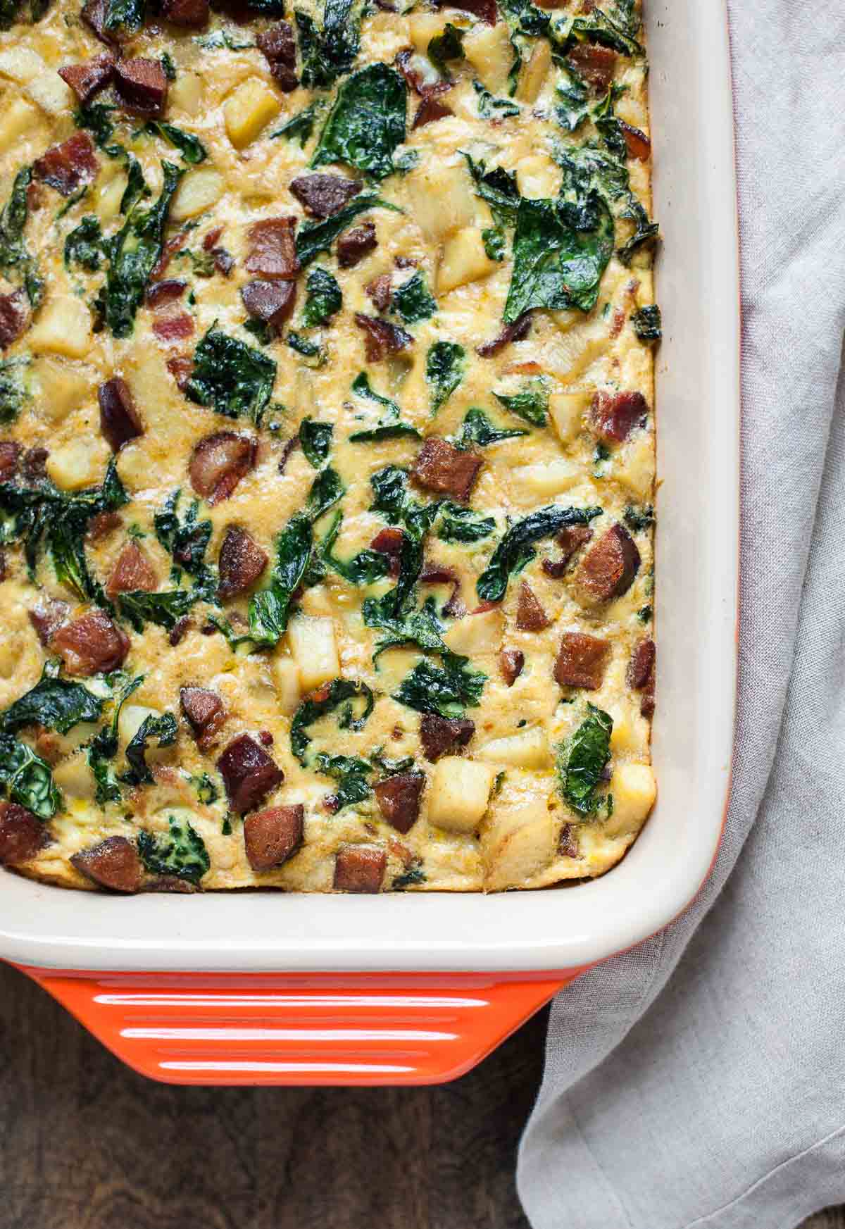 Top 15 Paleo Recipes of 2015--Breakfast Casserole with Bacon, Sausage, Sweet Potatoes, and Kale (Whole30) | acalculatedwhisk.com