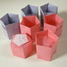 Stackable pentagonal boxes