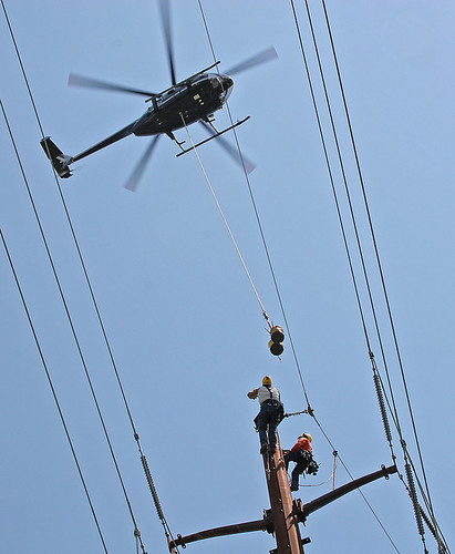 men 20d northerncalifornia canon photo wire line pole helicopter photograph precision sacramento workingmen towerworkers copyrightedmaterialallrightsreserved copyrightedallrightsreserved familygetty2010 familygetty