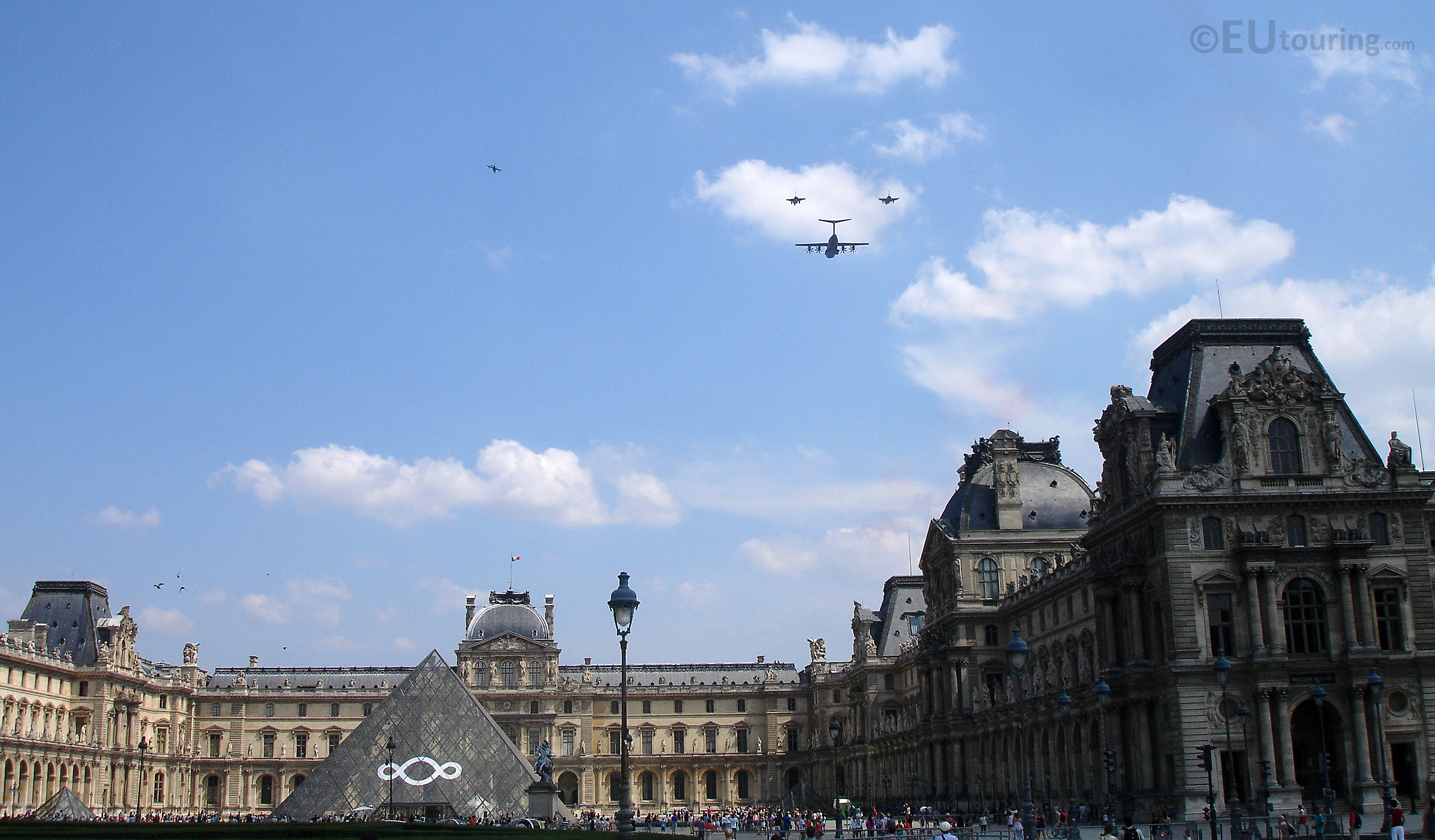 Planes above the Louvre Museum
