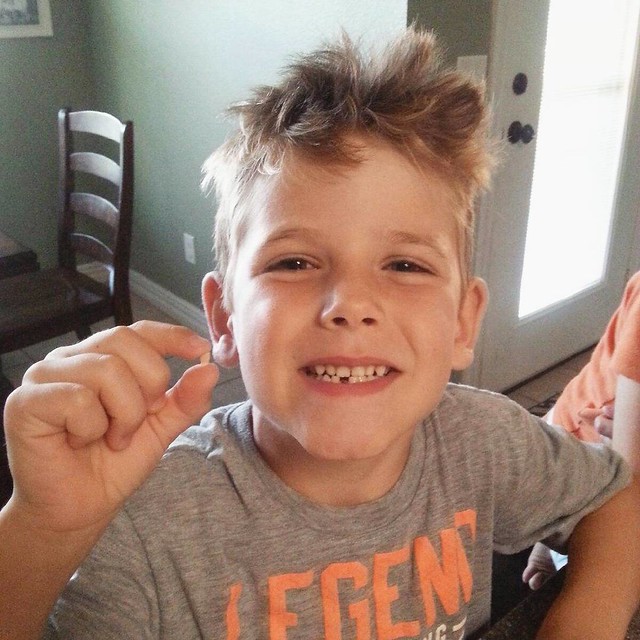 Brayden decided that the weekend I was gone would he a good time to lose his first tooth. Can't believe he's big enough to be snaggle toothed. #mboys2015