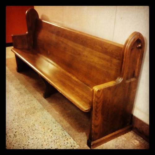 I mean, why wouldn't there be a church pew in our building's lobby?