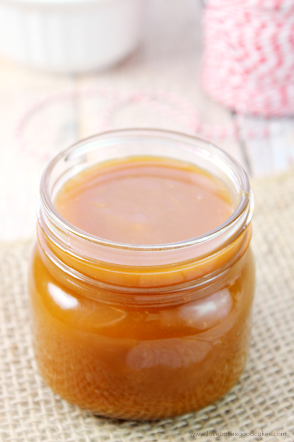 Salted Caramel in a glass jar with the lid removed.