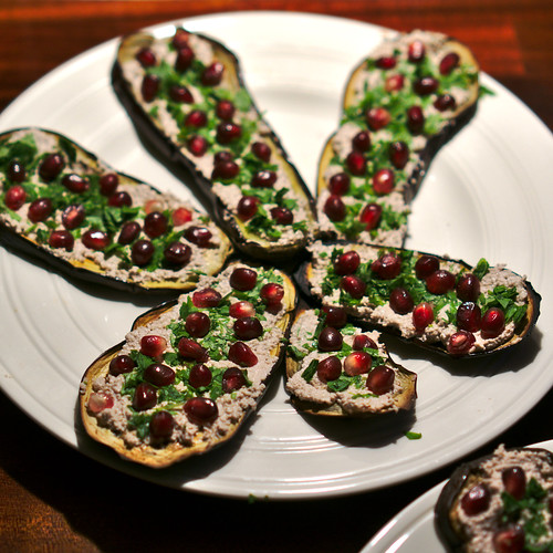 slices of aubergine with pomegranate