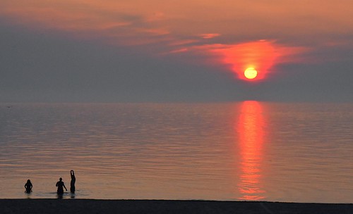 sunset people usa sun lake seascape reflection beach silhouette clouds swimming landscape evening nikon michigan lakemichigan sawyer swimmers shorewood 18200mm stevelamb d7200