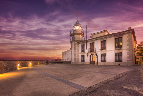 sunset lighthouse colors spain