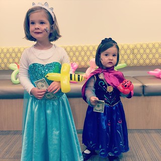 Some friends were going out of town and couldn't attend the dentist's candy-buy-back party, so they gave us their unwanted candy. We picked out all the Reese's and brought in the rest. Elsa and Anna were thrilled to each receive a dollar of their very own