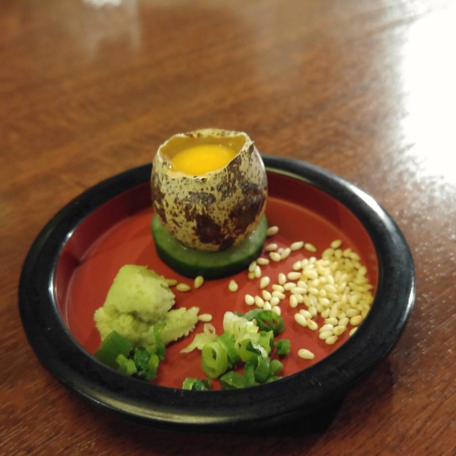 Quail egg and sesame seeds in addition to fresh wasabi and spring onion to accompany cold noodles Bikan quarter, Kurashiki