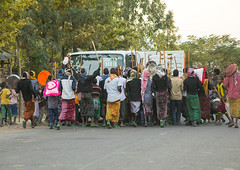Oromo wedding celebration blocking a truck on a road, Amhara region, Artuma, Ethiopia