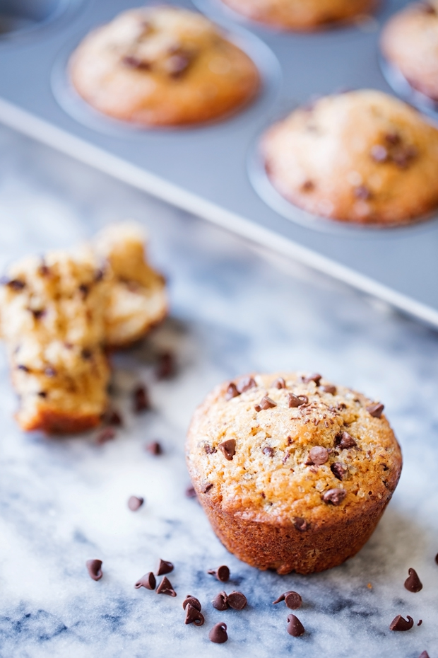Bakery Style Chocolate Chip Muffins - Made with coconut oil and greek yogurt, these muffins are healthy and delicious! #coconutoil #muffins #chocolatechipmuffins | Littlespicejar.com