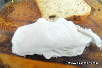 Paneer Bread Roll Recipe - Wrap the bread paneer roll with a wet muslin cloth