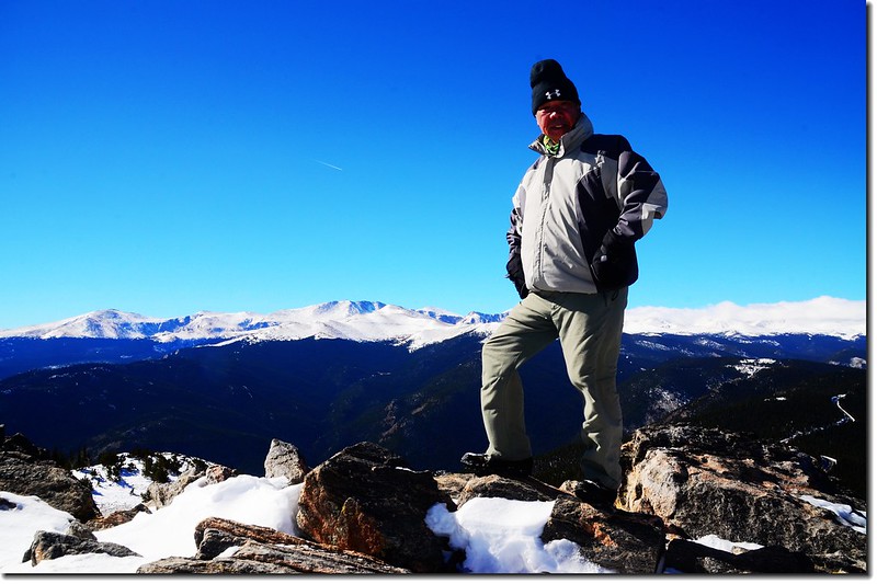 Me on the summit of Chief Mountain, in the background is Mount Evans Massif 2