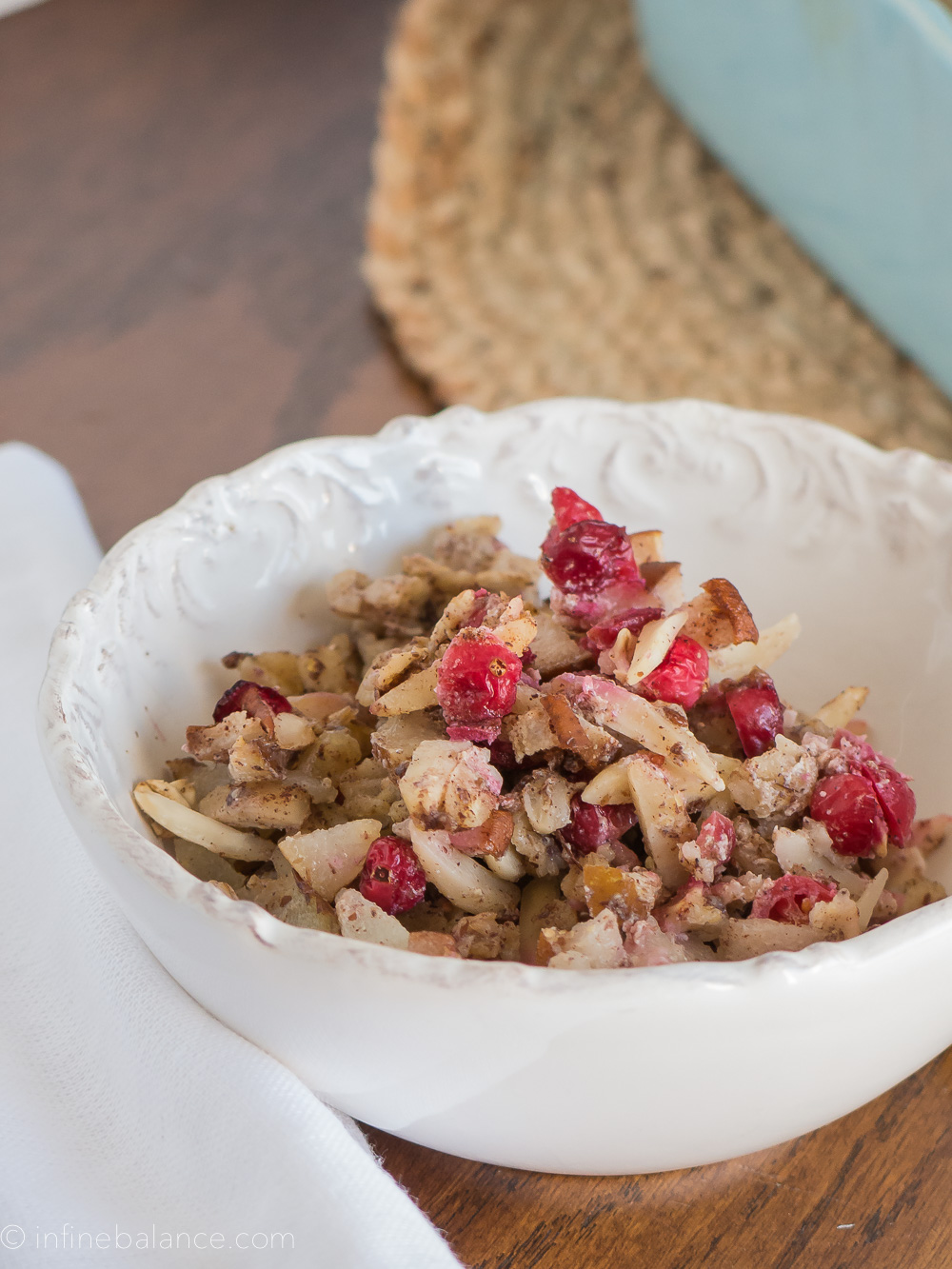 a bowl of cranberry and pear baked oatmeal