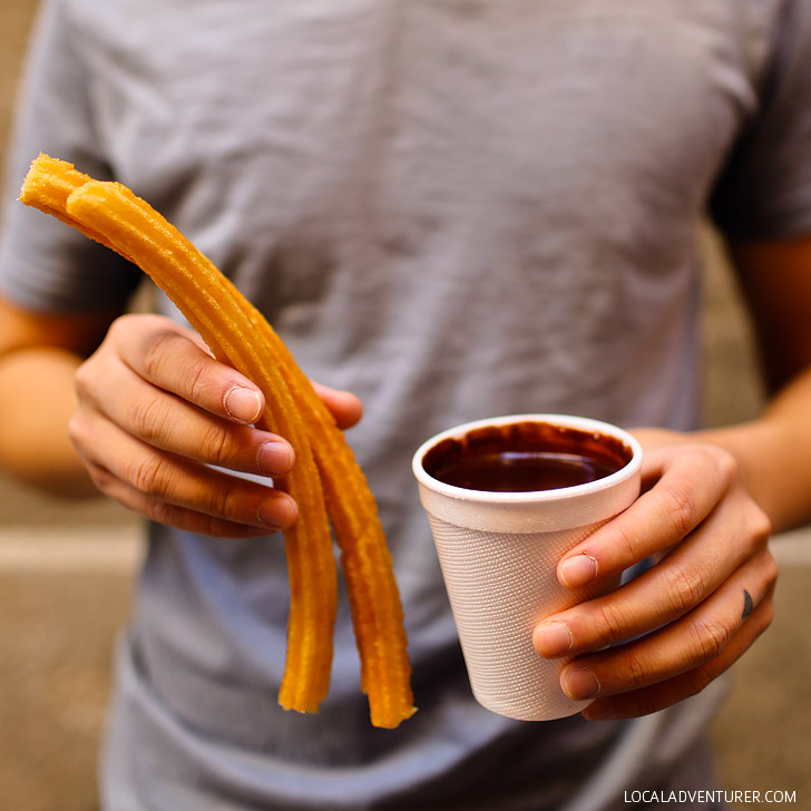 Churros con Chocolate from the famous Chocolateria San Gines in Madrid. Also check out the other 15 Spanish foods you must try | Typical Food of Spain