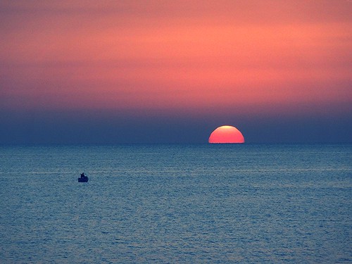 sun barca mare alba sole