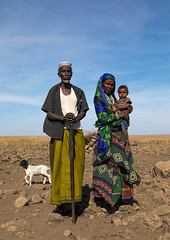 Issa tribe man with his wife and child, Afar region, Yangudi Rassa National Park, Ethiopia