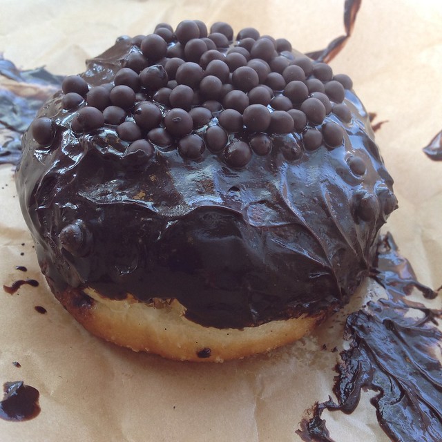 Blue Star Donuts chocolate frosted and vanilla cream filled donut