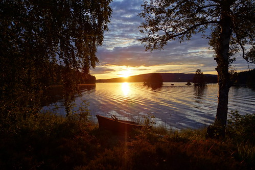 sunset summer lake water landscape evening boat sweden hills serene waterscape