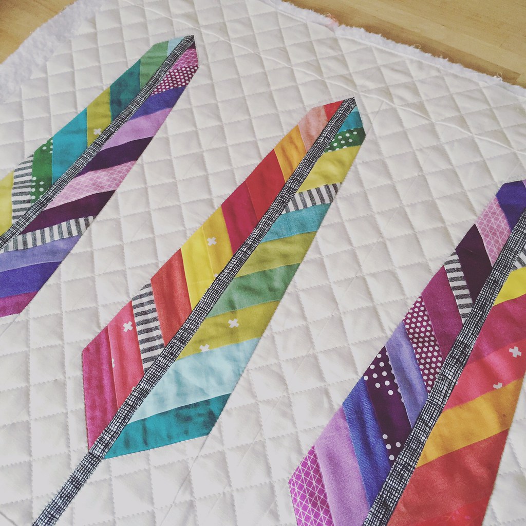 mini rainbow feather quilt