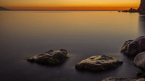 sunset sea beach zeiss relax geotagged rocks long exposure sony relaxing 24mm tranquil 6000 ilce mirrorless a6000