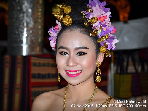 facingtheworld people photo colour night northernthailand chiangrai dancer beautiful eyecontact travel thaibeauty floralhairwreath tourism asia blue gold redlips beautifuleyes ©matthahnewaldphotography ethnic ethnicportrait posing makeup 43aspectratio touristattraction image flashfired builtinpopupflash worldcultures cultural oneperson character flowersinhair female youngadult thai horizontalformat human gorgeous lips photography consent empathy rapport portrait portraiture travelportrait traveldestination nightmarket enface frontview colourful facialexpression smiling thaismile beauty girl jewellery hairjewellery nightbazaar primelens humanface lipstick depthoffield teeth humaneyes nightshot 50mm outside closeup street