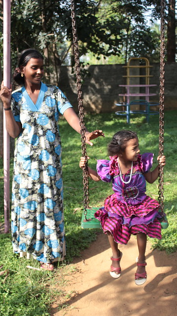 Rupa and Bhagya in the Royal Enclave property owner welfare association (REPOWA) park. Normally this park is off limits for domestic helpers and their children but road upgrades around the lake have unlocked many doors!