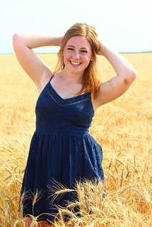Took some of this gorgeous girls senior photos in her Dad's wheat field we were combining!