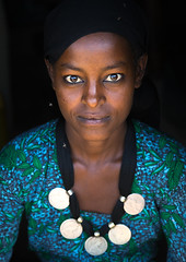 Portrait of an Oromo woman with maria theresa thalers necklace, Amhara region, Kemise, Ethiopia