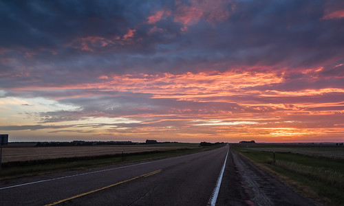 road travel sunset summer sky sun field grass lines clouds southdakota rural highway sundown flat farm horizon route rays prairie southshore