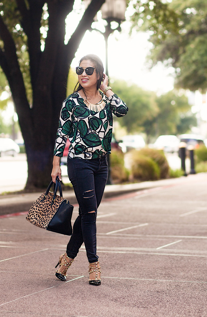 cute & little blog | petite fashion | leaves print top, distressed black jeans, studded pumps, clare v. leopard sandrine bag | fall outfit