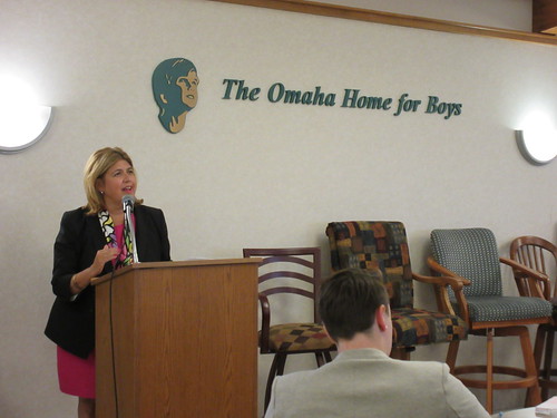 AMS Administrator Anne Alonzo in front of an audience in Nebraska