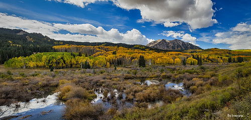 travel blue autumn trees red sky panorama mountain mountains green art fall tourism colors leaves yellow clouds forest season october colorado image pass large rocky peak september prints rockymountains aspen gunnison kebler jamesinsogna