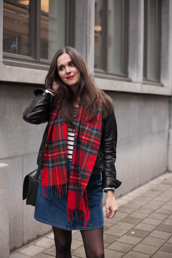 Outfit: leather jacket, plaid scarf, striped top and denim a-line skirt