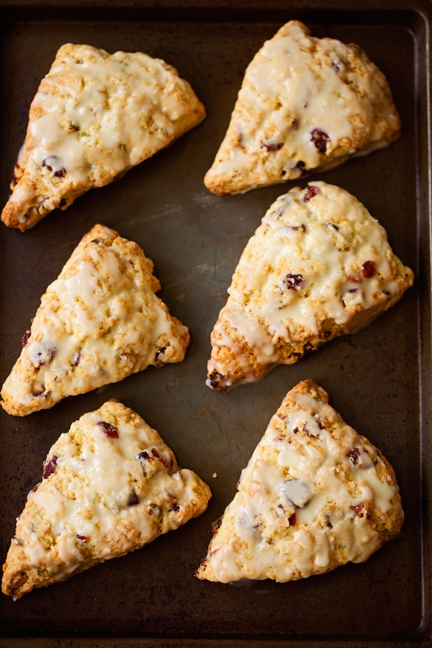 Cranberry Orange Scones with Pistachios - these scones are tender and flakey. The pistachios add such a nice nuttiness and crunch! #orangescones #pistachioscones #cranberryorangescones #scones | Littlespicejar.com
