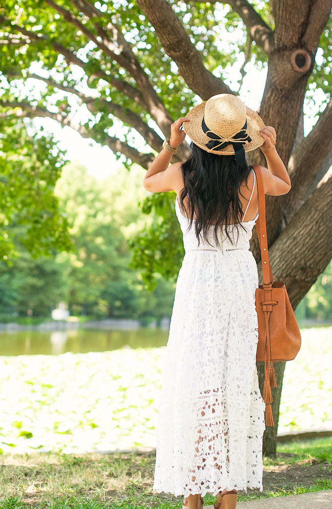 cute & little blog | petite fashion | white crochet lace maxi dress, tassel bucket bag, boaters hat | summer outfit