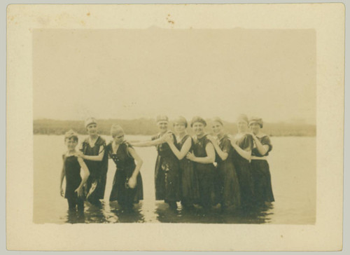 Nine Swimmers forming a chain