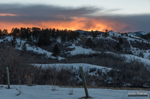 story wyoming march winter spring snow snowy nikond750 color colorful sunset orange sky evening tamron2470mmf28 fence posts