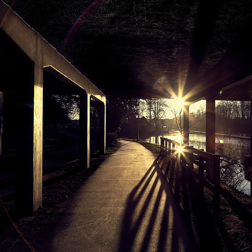 bridge sunset golden light rays
