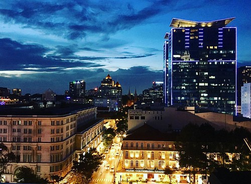 bar light evening time blue sunset view rooftop caravelle district1 twilight night city vietnam hochiminhcity saigon instagramapp square squareformat iphoneography clarendon hotel southeast asia