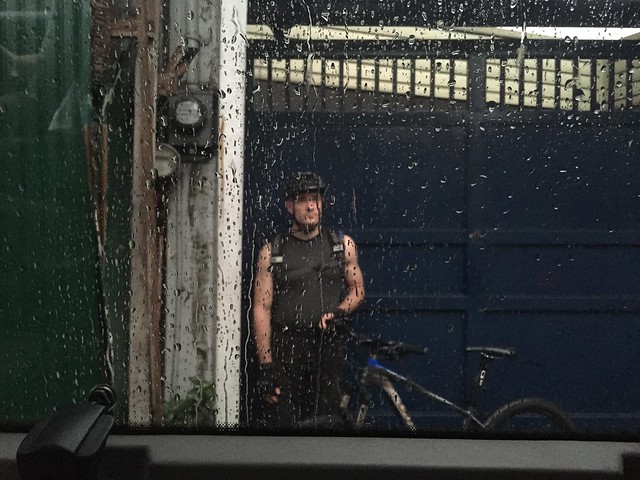 Foreigner biker in the rain, San Juan, Metro Manila