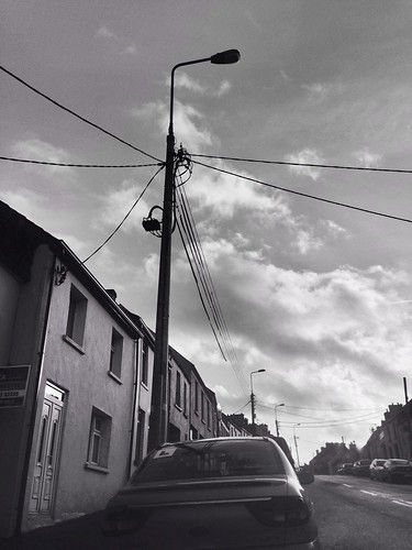 street ireland sky bw irish monochrome car clouds town view cork utility pole newmarket htt dualpurpose telegraphtuesday 2015onephotoeachday