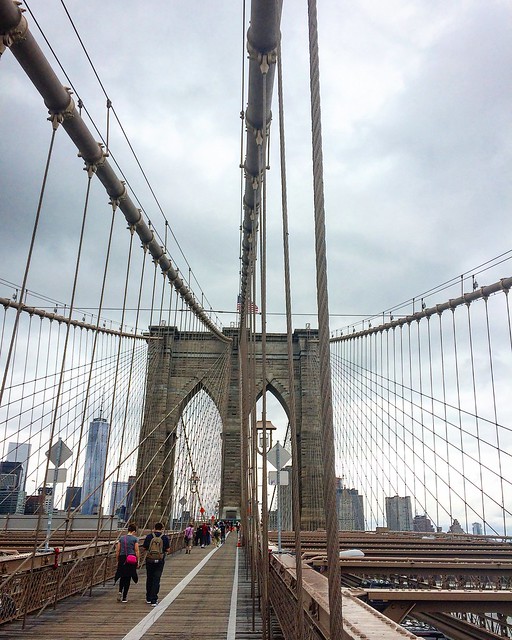 walking over the Brooklyn Bridge