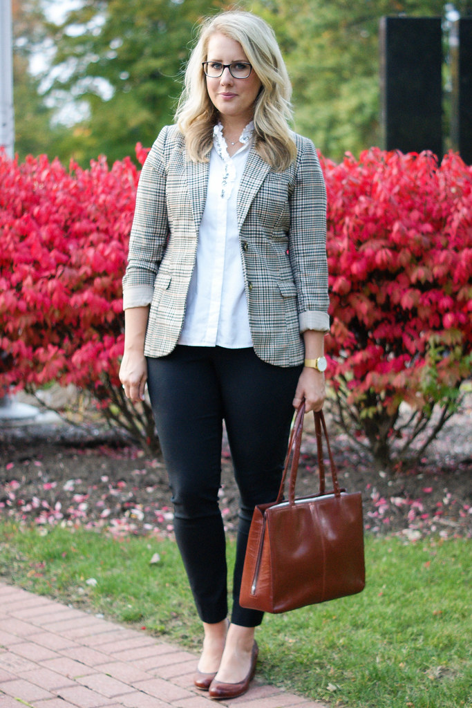 plaid blazer with white top and black pants